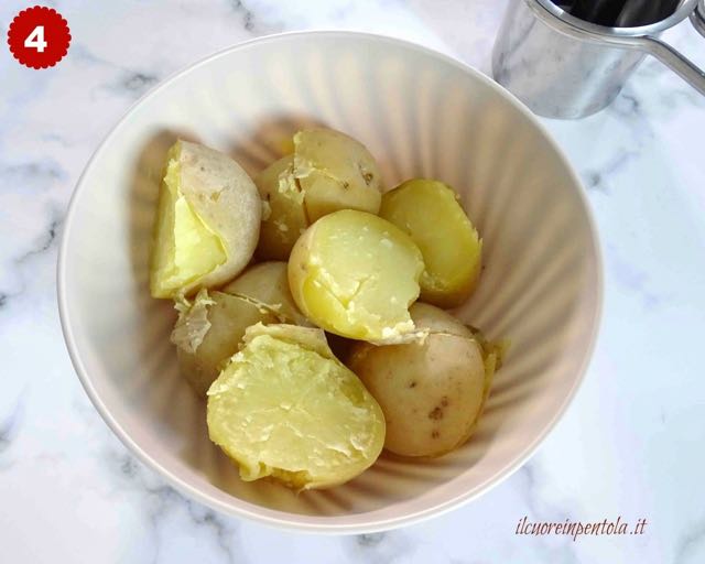 schiacciare patate